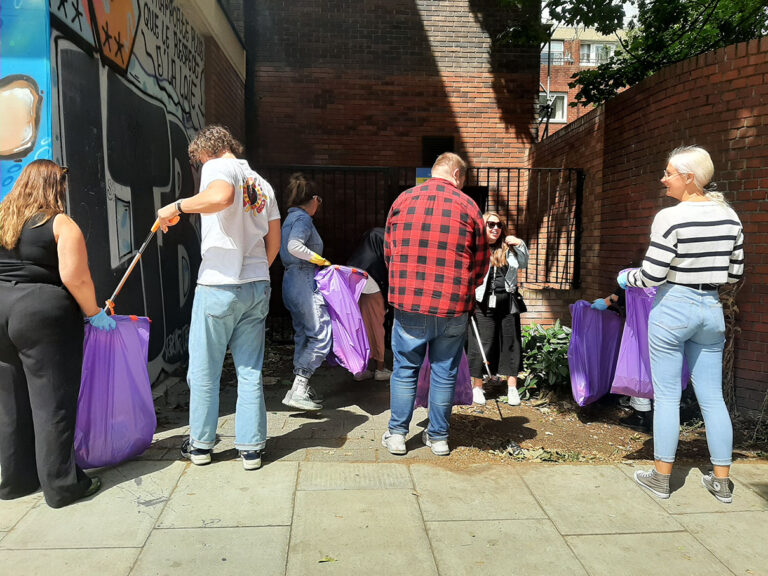 Team engaged in litter picking close to their office in Old Street